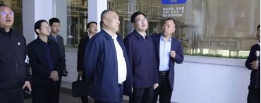 省发改委地区处朱文治处长莅临QY国际参观指导